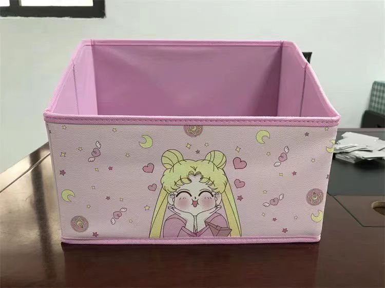 Rosa tidningsställ - Sailor Moon med gladaste kinderna