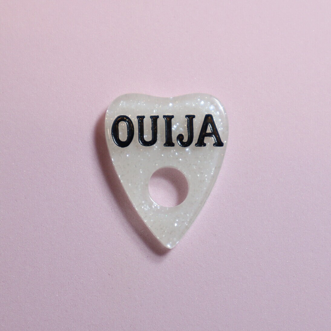 Brosch - Vit glittrig Ouija-pekare
