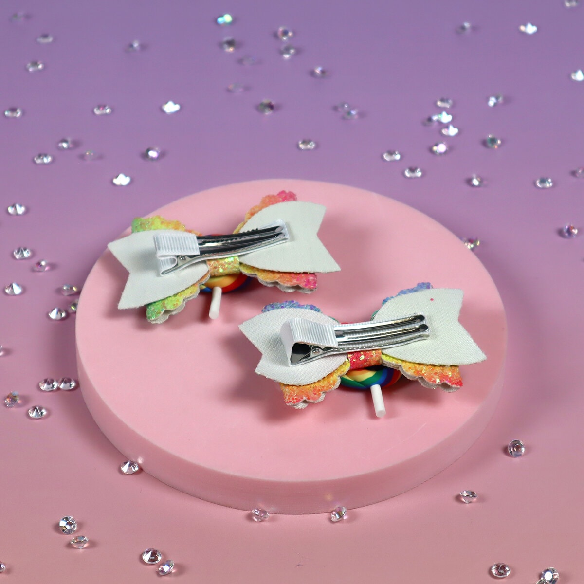 2-Pack Glittriga rosetter med klubba