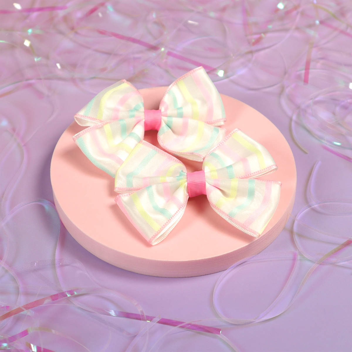 2-Pack pastellrandiga rosetter