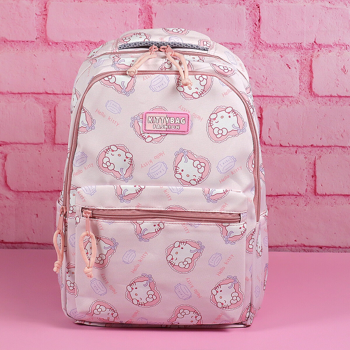 Hello Kitty-mönstrad ryggsäck