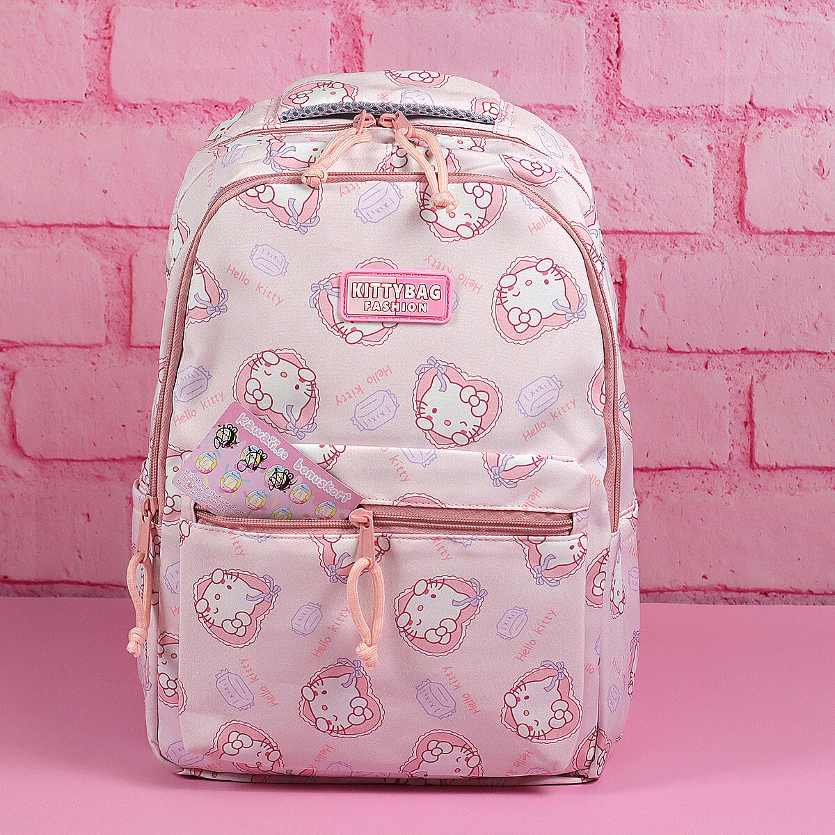 Hello Kitty-mönstrad ryggsäck