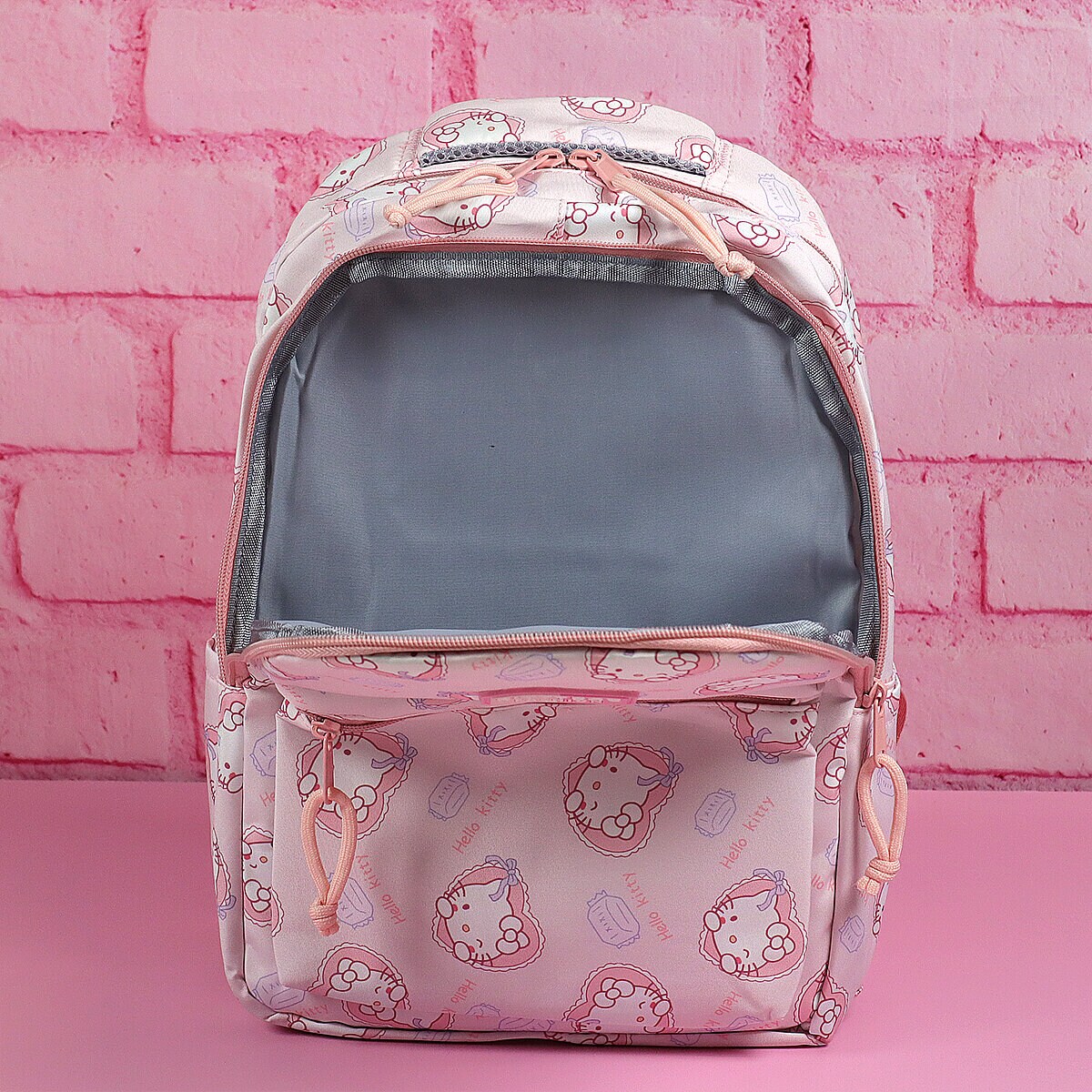 Hello Kitty-mönstrad ryggsäck