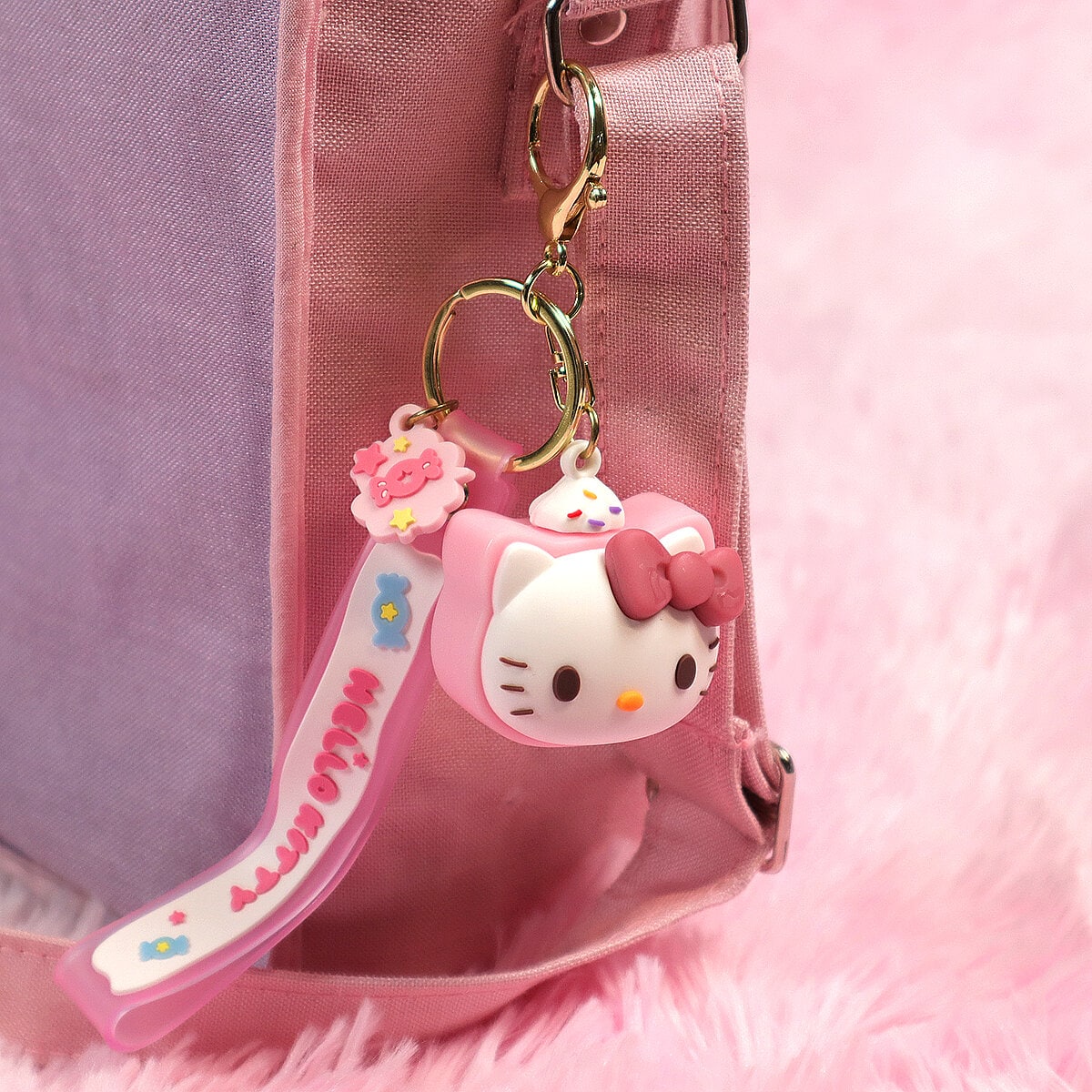 Nyckelring - Hello Kitty-rulltårta