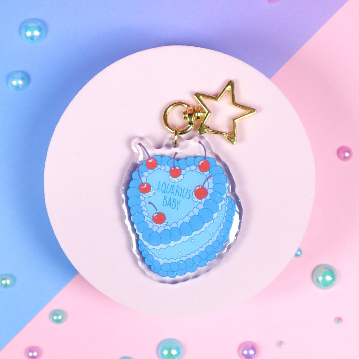 Glittrig bag charm - Aquarius cake