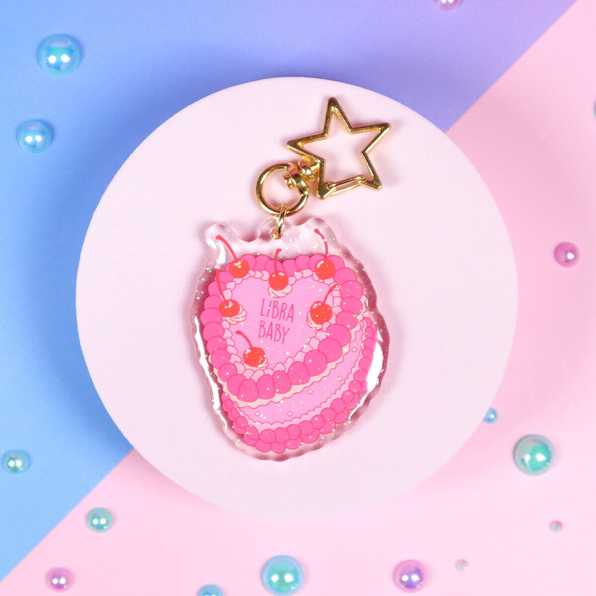 Glittrig bag charm - Libra cake