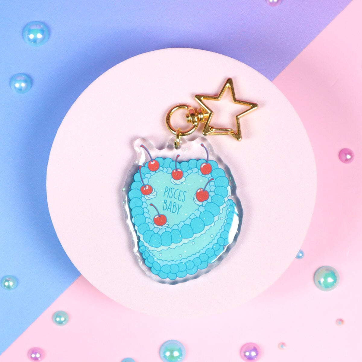 Glittrig bag charm - Pisces cake