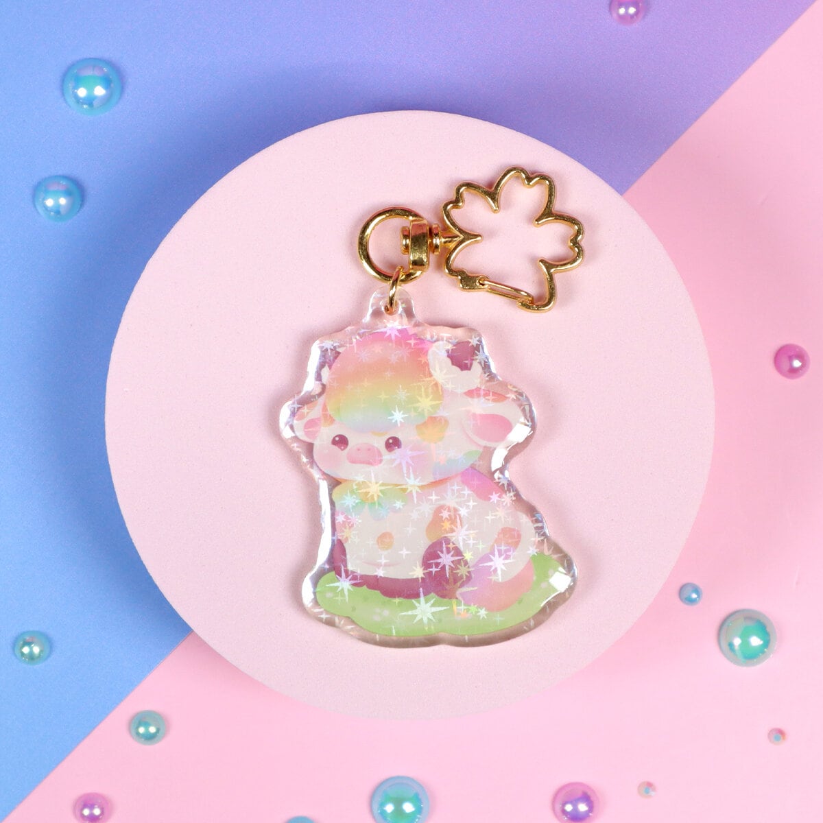 Glittrig bag charm - Pride cow