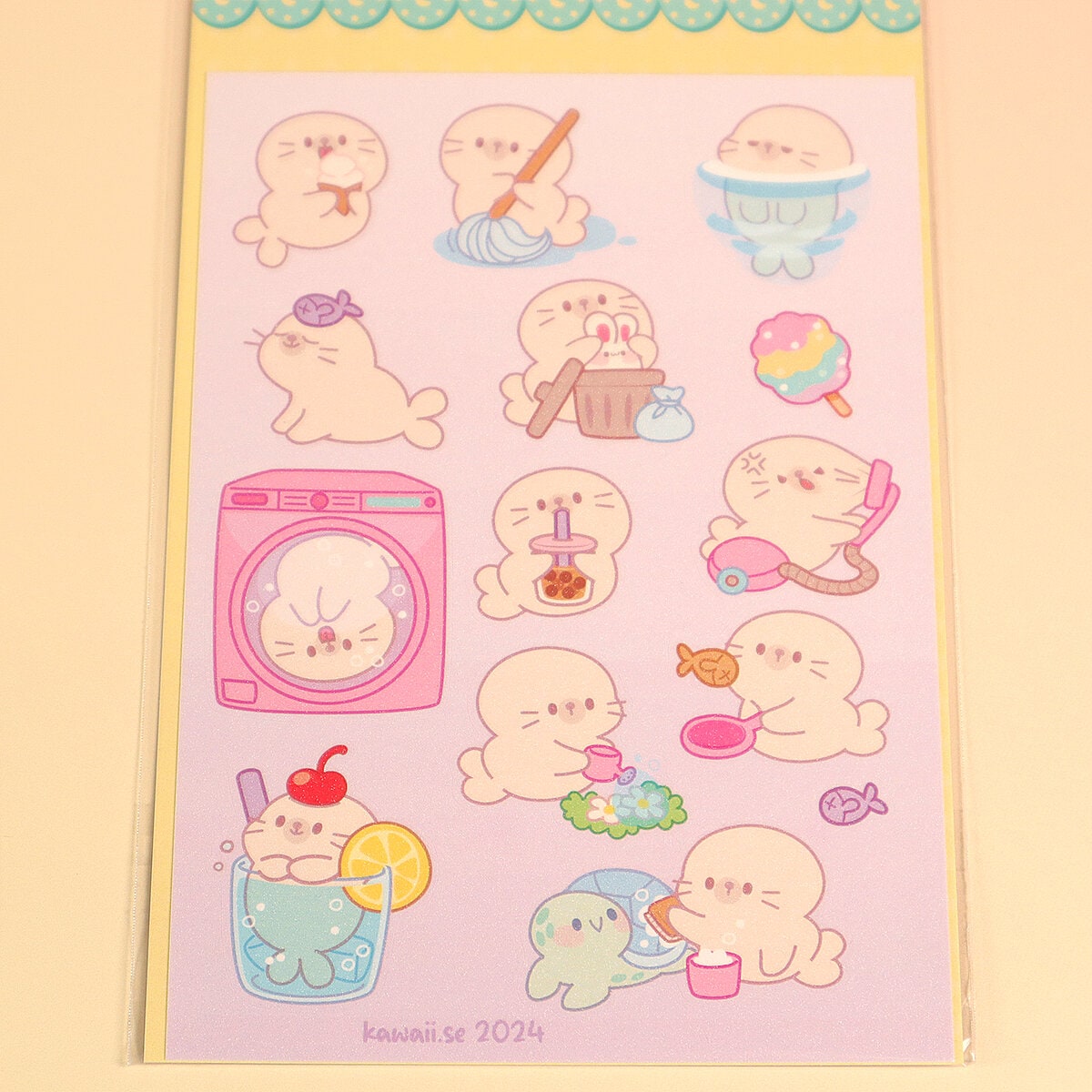 Stickersark A6 - Seal doing chores