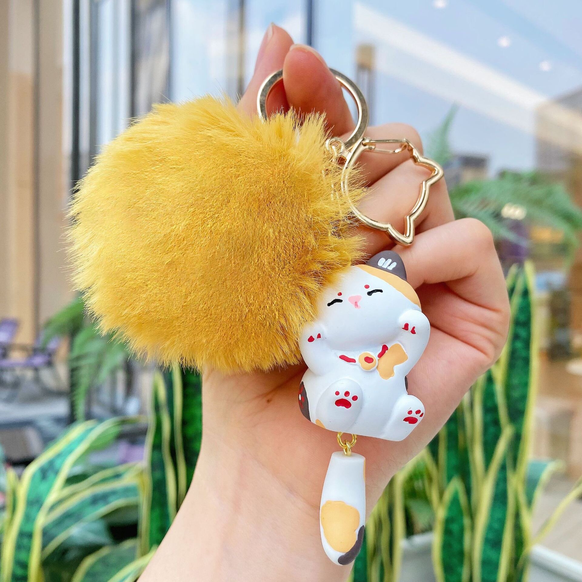 Puffig bag charm calico katt med svans