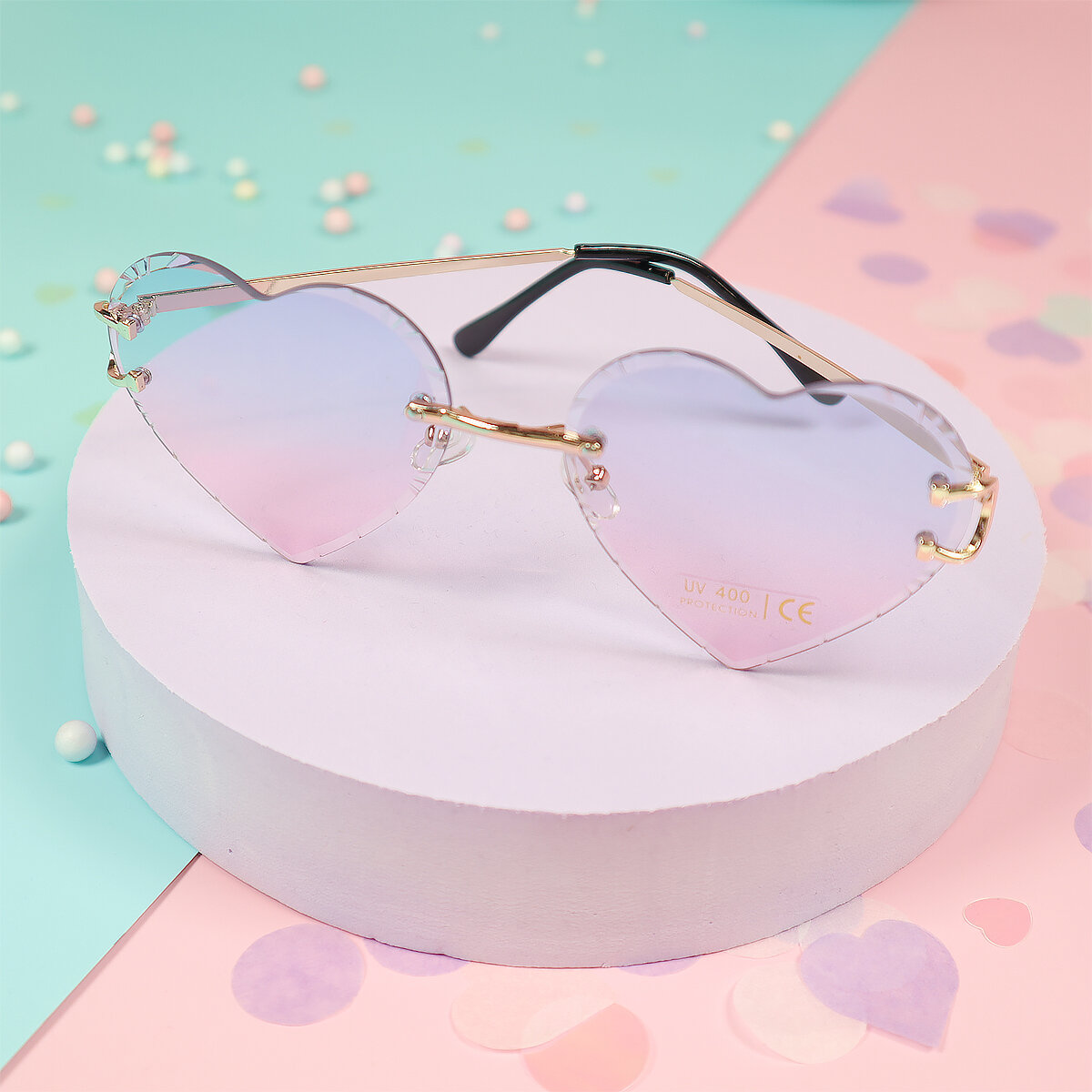 Solglasögon - lila-rosa fasetterade hjärtan