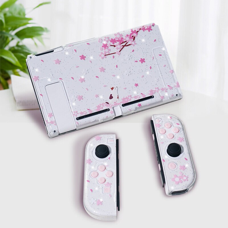 Glittrigt switchfodral & joysticks sakura
