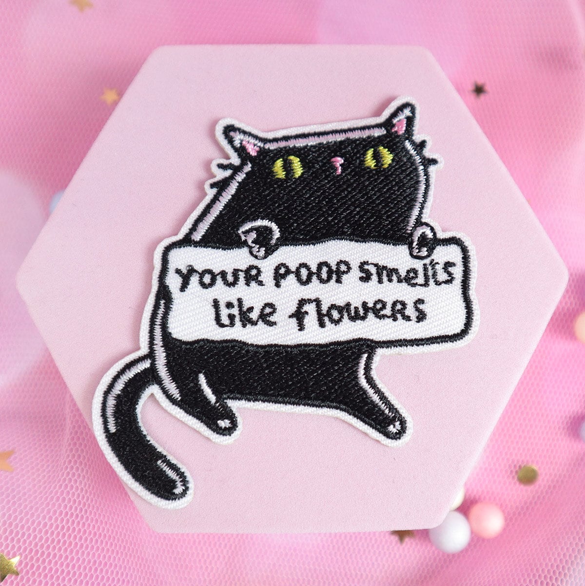 Tygmärke Cat, poop smells like flowers